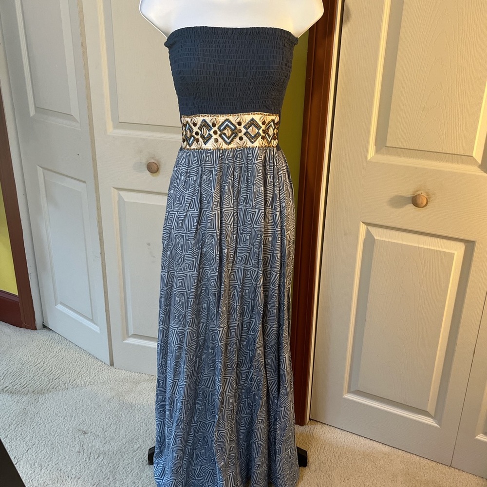 Blue tube dress with shell waist band.